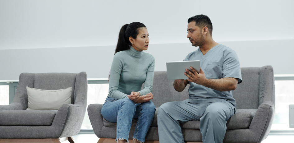 Inland Empire doctor talks with a patient