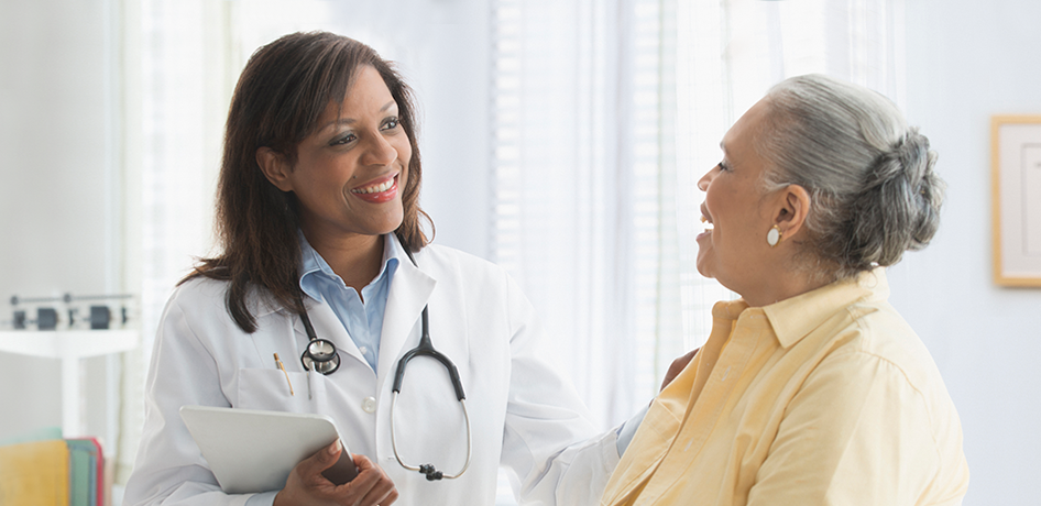 Inland Empire doctor talks with a patient